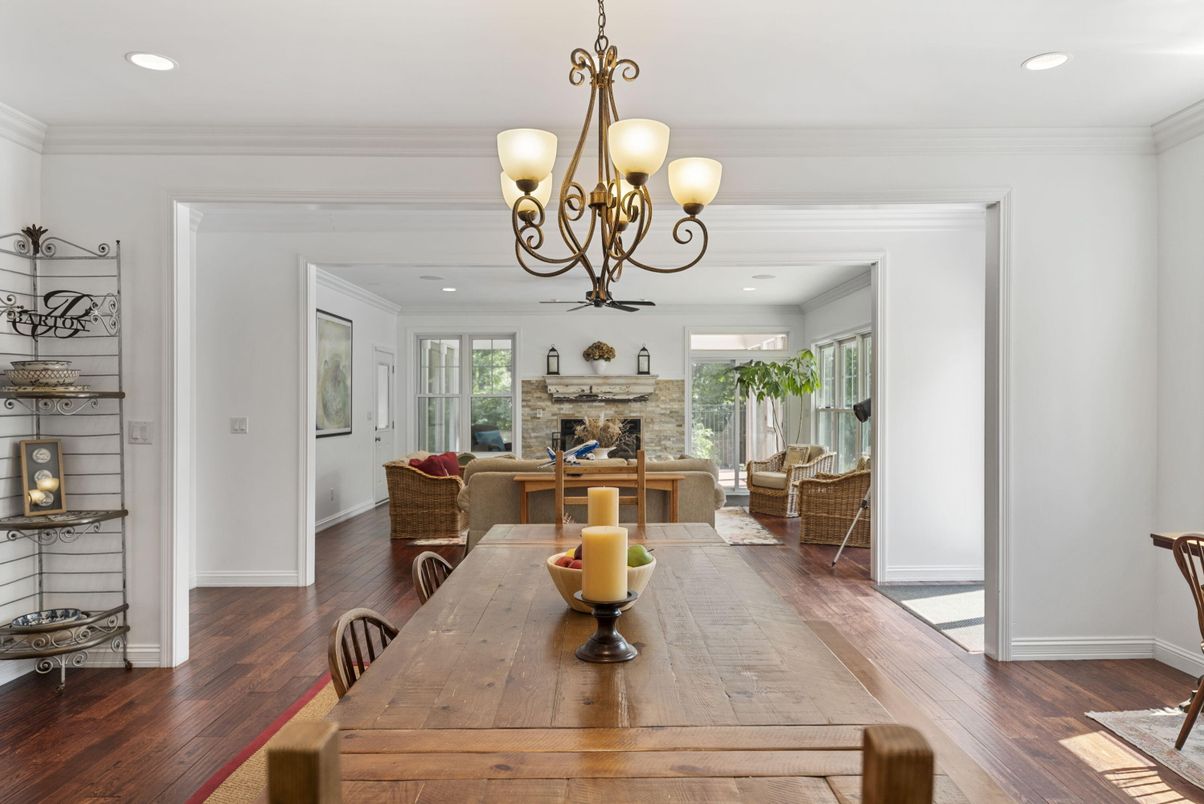 Chandelier, Dining room, Fireplace, Interior, Living room, Recessed Lighting, Wood Texture Flooring