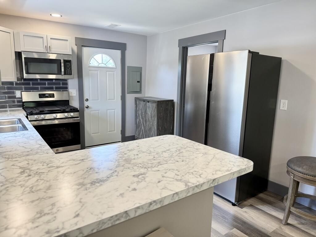 Interior, Kitchen, Recessed Lighting, Stainless Steel Appliances, Wood Texture Flooring