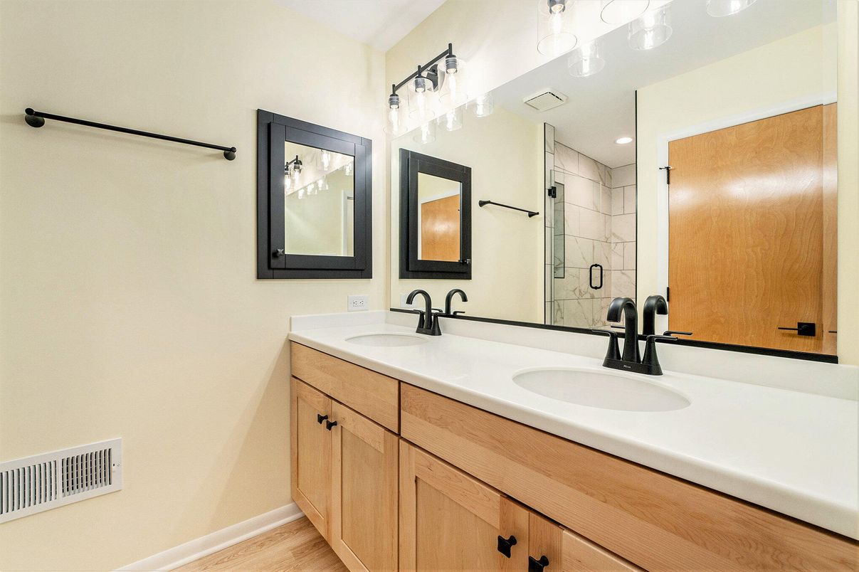 Bathroom, Dual Sink Vanities, Interior, Recessed Lighting, Wood Texture Flooring
