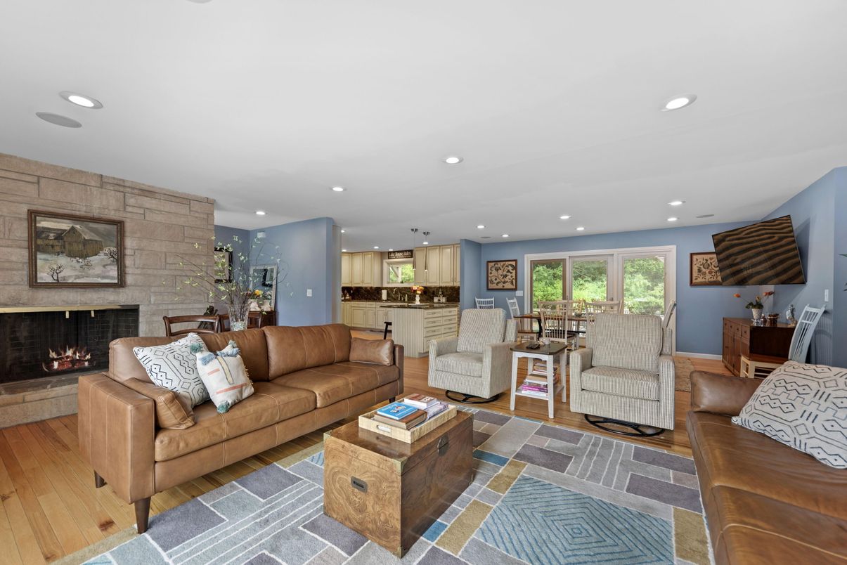 Dining room, Fireplace, Interior, Kitchen, Living room, Recessed Lighting, Stone Walls, Wood Texture Flooring