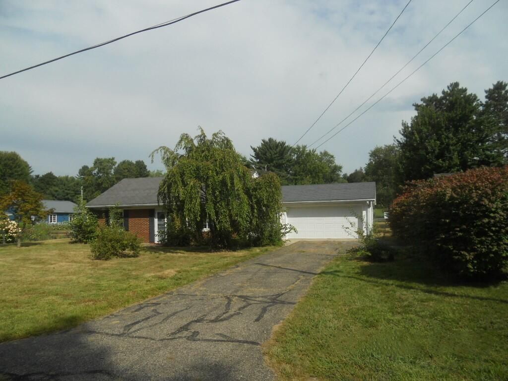 Attached, Backyard, Exterior, Facade, Brick Facade, None