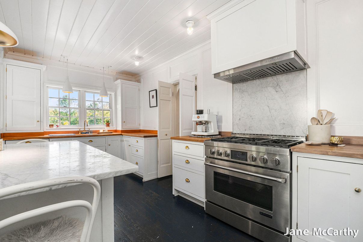Interior, Kitchen, Marble Walls, Stainless Steel Appliances, Wood Texture Flooring