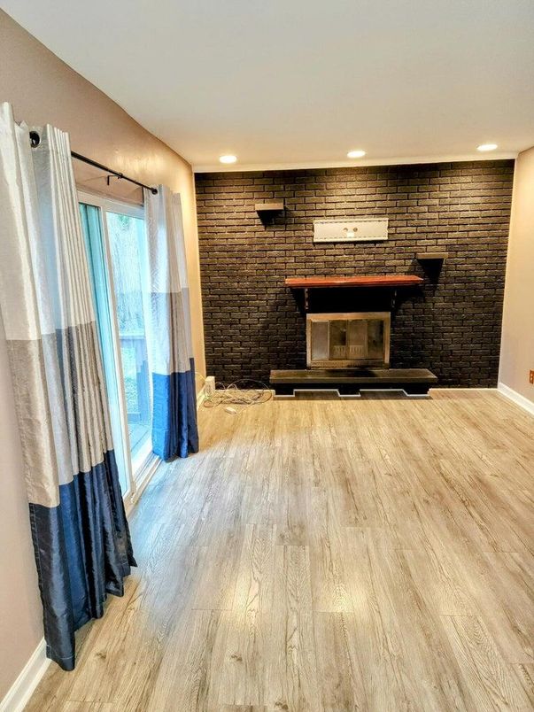 Fireplace, Interior, Recessed Lighting, Stone Walls, Wood Texture Flooring