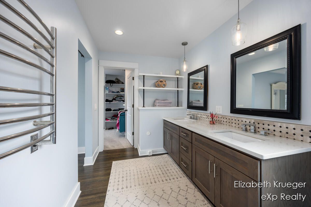Bathroom, Dual Sink Vanities, Interior, Pendant Lights, Recessed Lighting, Wood Texture Flooring