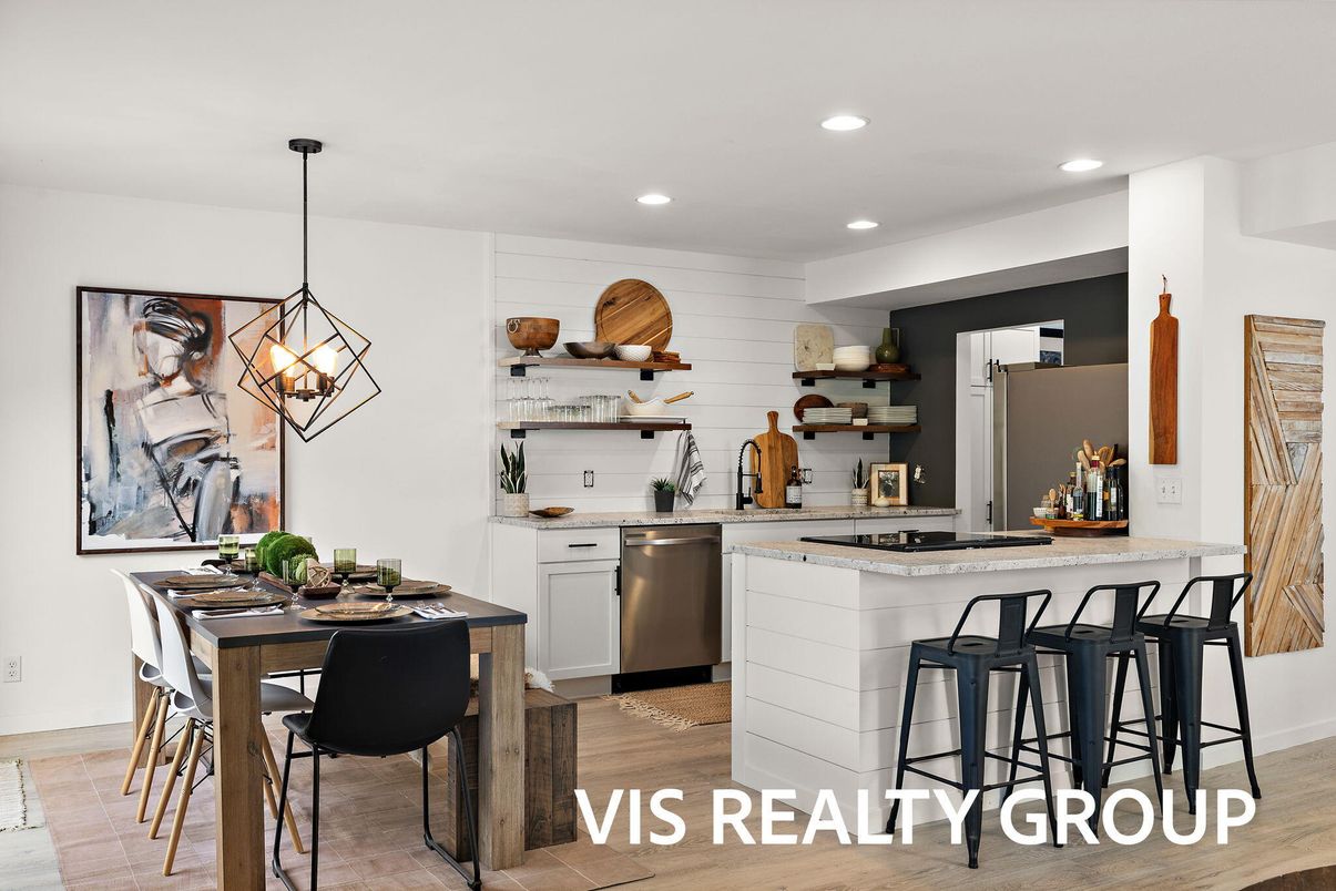 Dining room, Interior, Kitchen, Pendant Lights, Recessed Lighting, Stainless Steel Appliances, Wood Texture Flooring