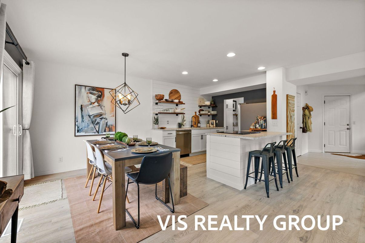 Dining room, Interior, Kitchen, Pendant Lights, Recessed Lighting, Stainless Steel Appliances, Wood Texture Flooring