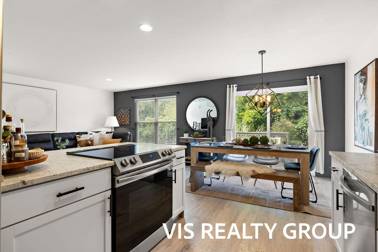 Dining room, Interior, Kitchen, Pendant Lights, Recessed Lighting, Stainless Steel Appliances, Wood Texture Flooring