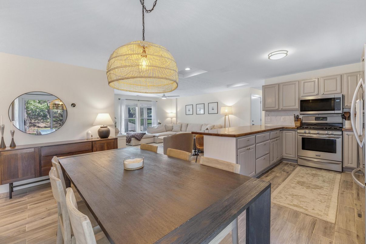 Dining room, Interior, Kitchen, Living room, Pendant Lights, Recessed Lighting, Stainless Steel Appliances, Wood Texture Flooring