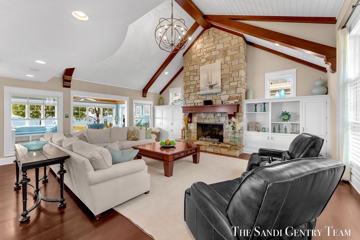 Chandelier, Fireplace, Interior, Living room, Recessed Lighting, Stone Walls, Wooden Beams, Wood Texture Flooring
