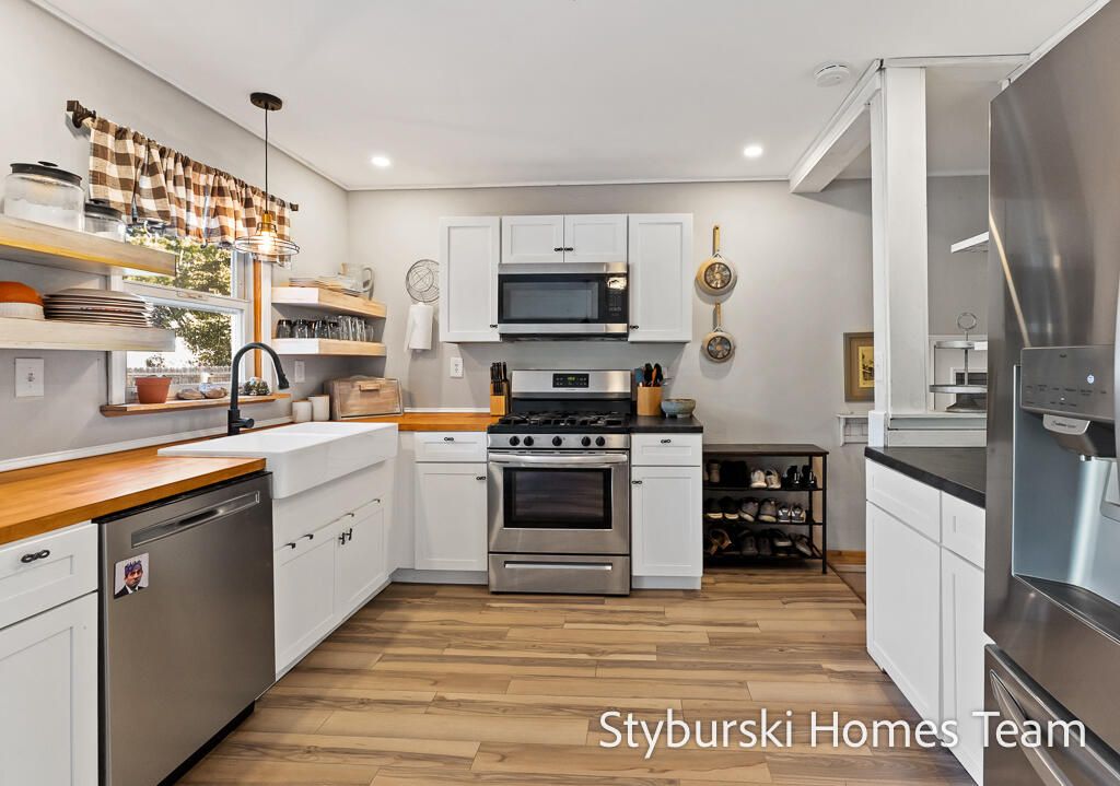 Interior, Kitchen, Pendant Lights, Recessed Lighting, Stainless Steel Appliances, Wood Texture Flooring