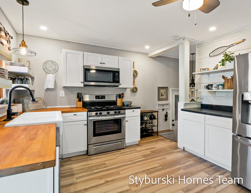 Interior, Kitchen, Pendant Lights, Recessed Lighting, Stainless Steel Appliances, Wood Texture Flooring