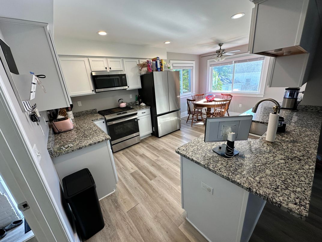 Dining room, Interior, Kitchen, Recessed Lighting, Stainless Steel Appliances, Wood Texture Flooring
