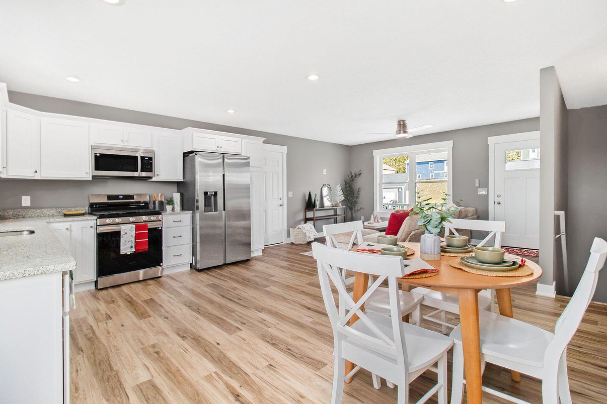 Dining room, Interior, Kitchen, Living room, Recessed Lighting, Stainless Steel Appliances, Wood Texture Flooring