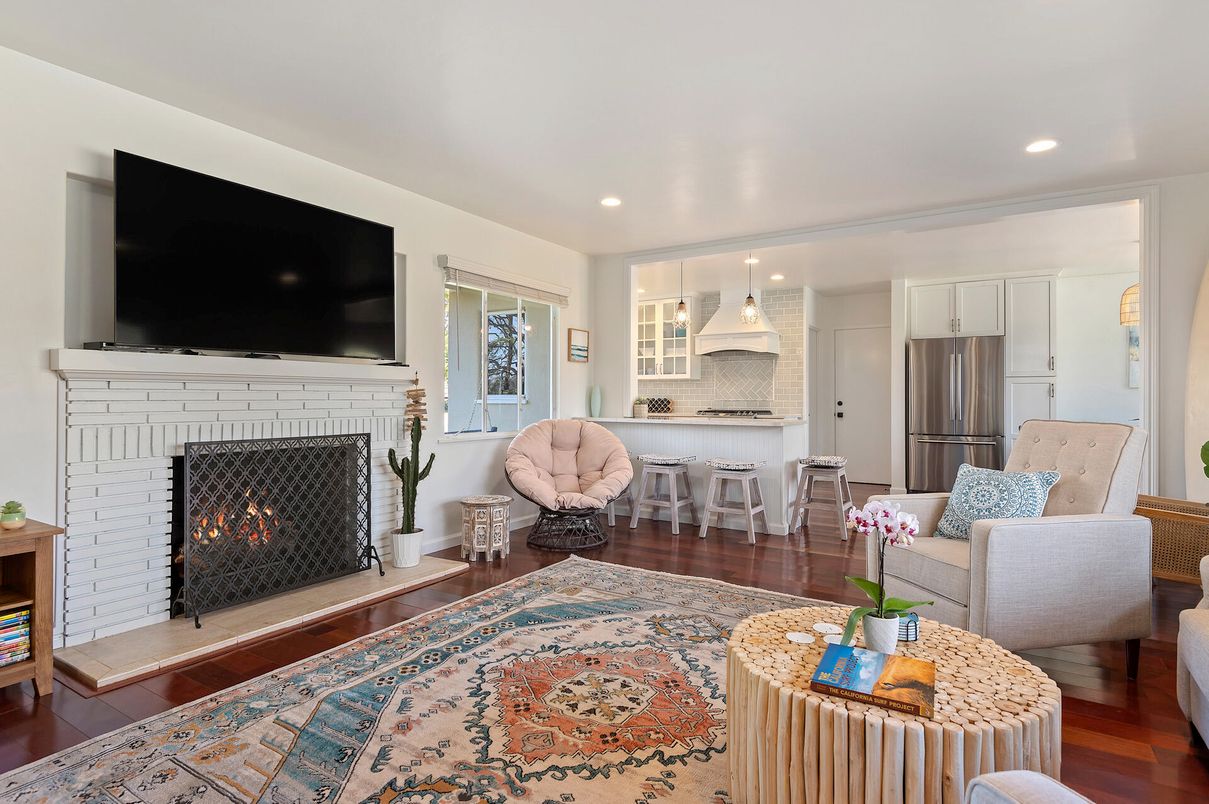 Fireplace, Interior, Kitchen, Living room, Pendant Lights, Recessed Lighting, Stainless Steel Appliances, Wood Texture Flooring