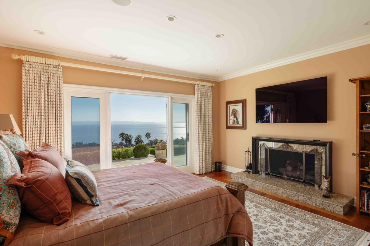 Bedroom, Fireplace, Interior, Recessed Lighting, Water, Wood Texture Flooring