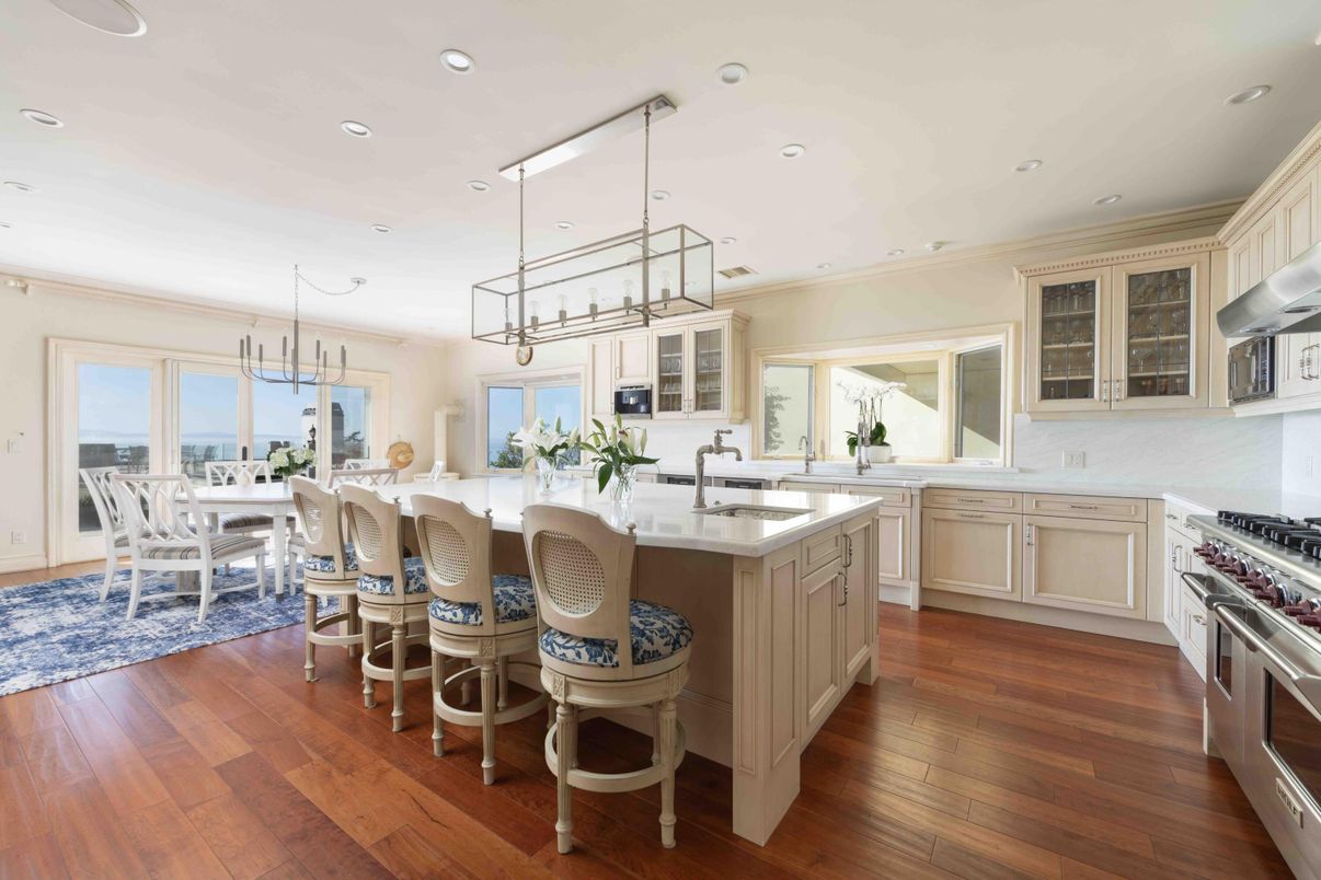 Chandelier, Dining room, Interior, Kitchen, Pendant Lights, Recessed Lighting, Stainless Steel Appliances, Wood Texture Flooring