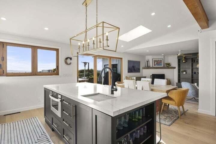 Chandelier, Dining room, Fireplace, Interior, Kitchen, Living room, Pendant Lights, Recessed Lighting, Wooden Beams, Wood Texture Flooring