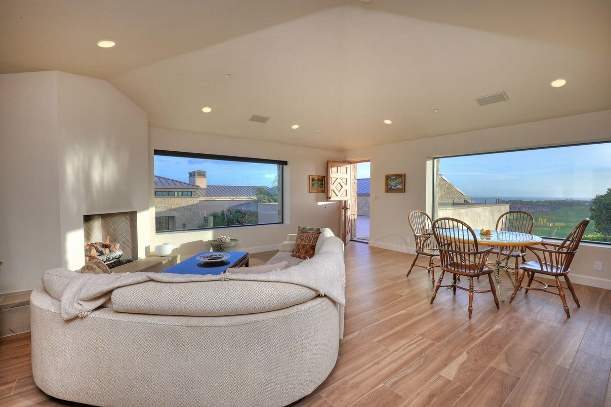Dining room, Fireplace, Interior, Living room, Recessed Lighting, Wood Texture Flooring