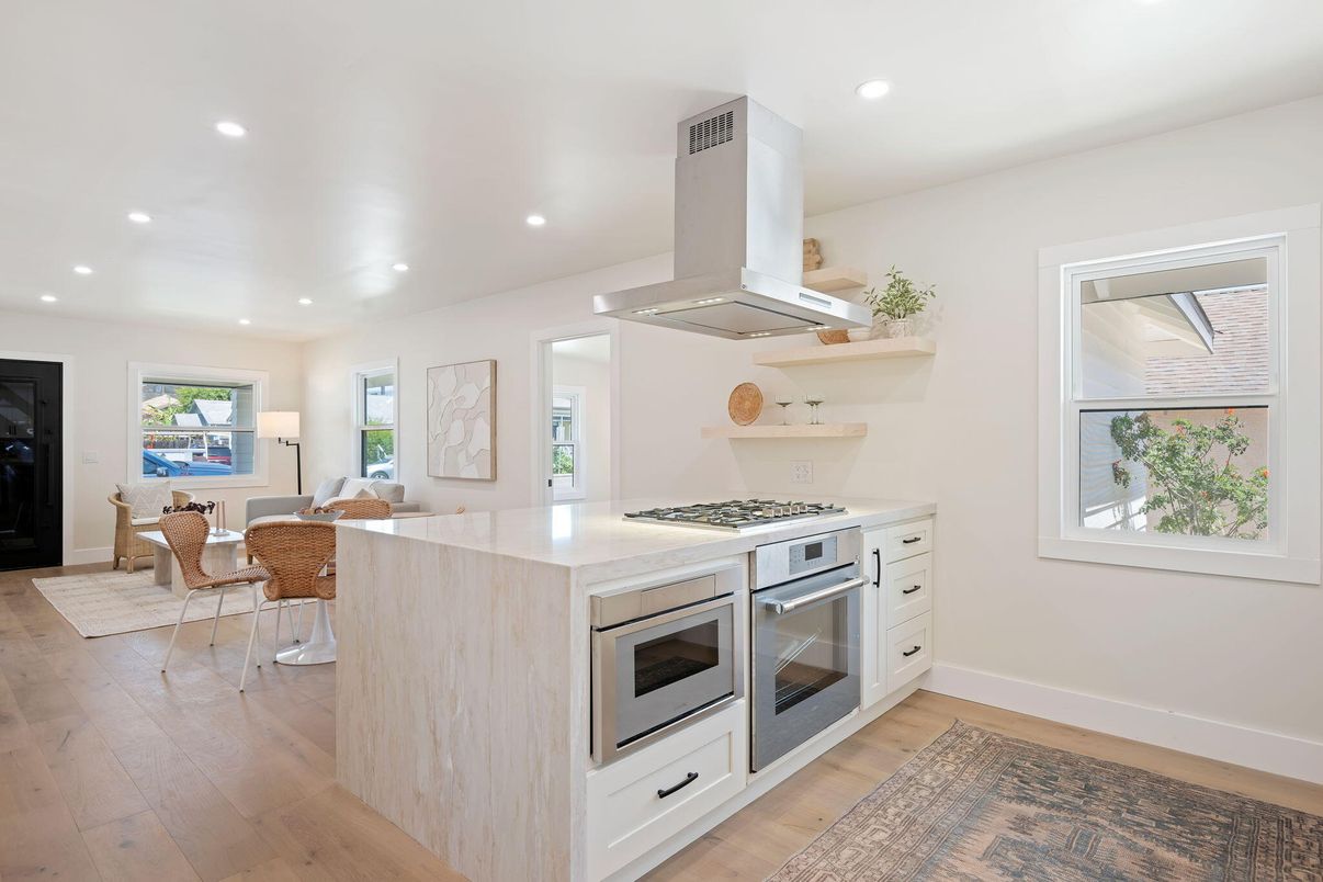 Dining room, Interior, Kitchen, Recessed Lighting, Stainless Steel Appliances, Wood Texture Flooring
