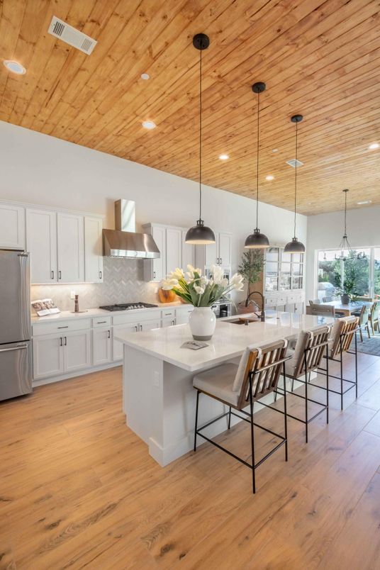 Dining room, Interior, Kitchen, Pendant Lights, Recessed Lighting, Stainless Steel Appliances, Wooden Ceilings, Wood Texture Flooring