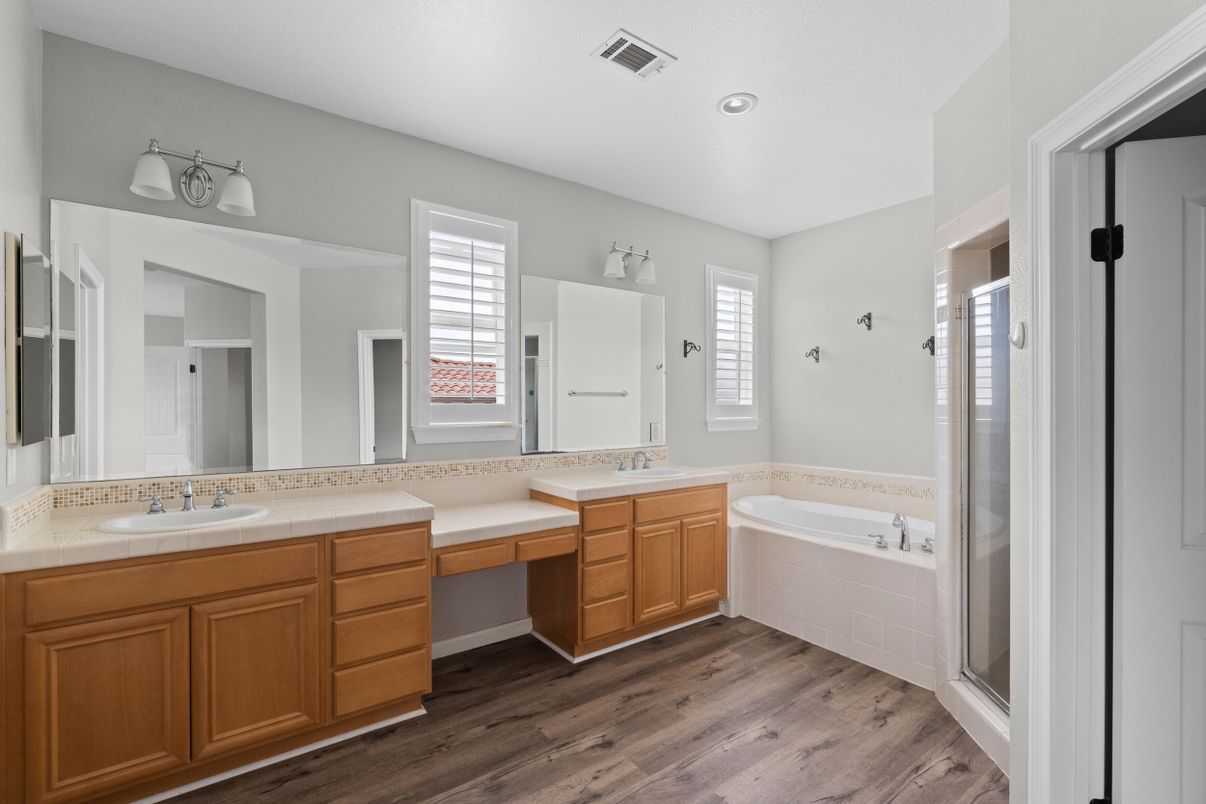 Bathroom, Dual Sink Vanities, Interior, Recessed Lighting, Tile Countertops, Wood Texture Flooring
