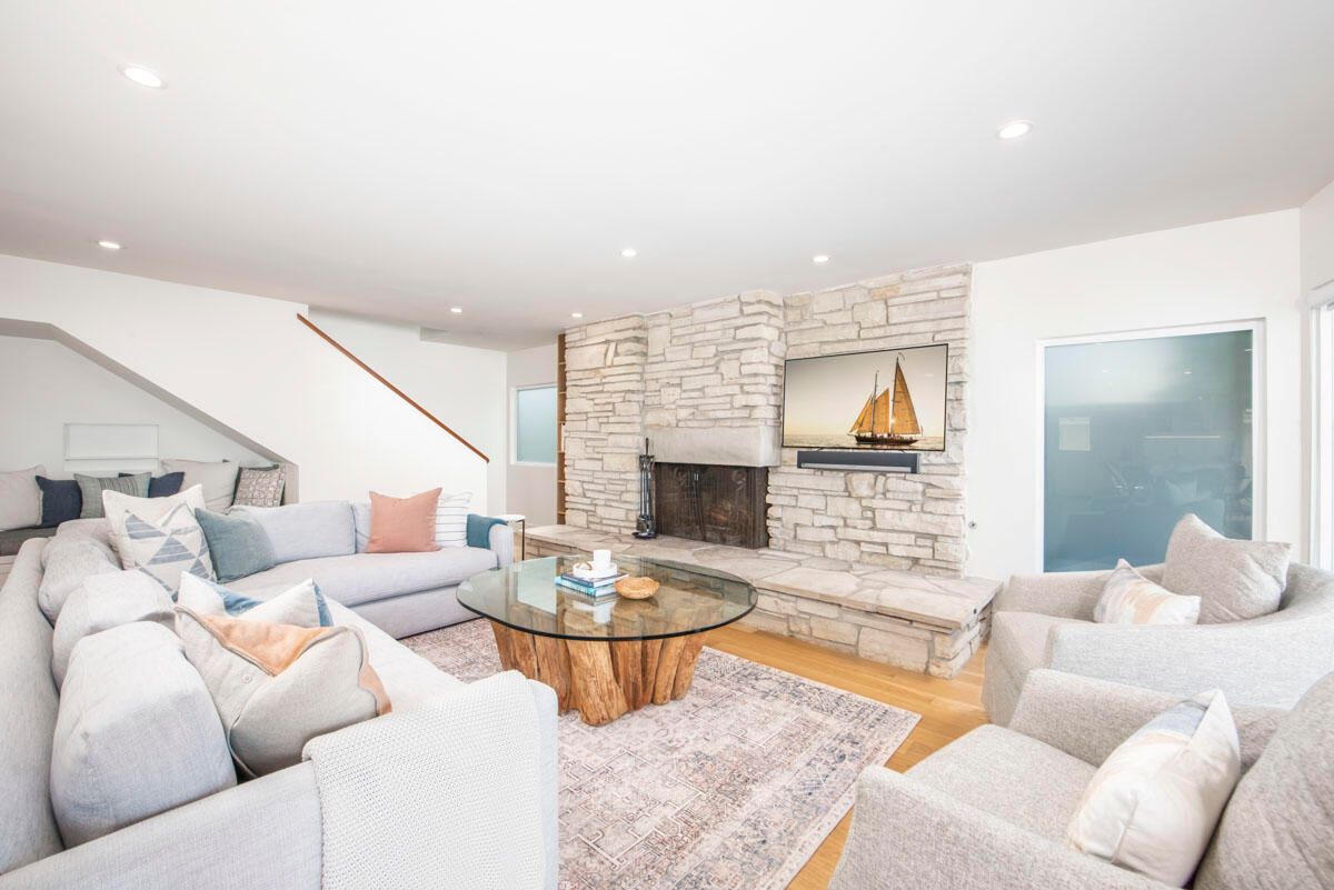 Fireplace, Interior, Living room, Recessed Lighting, Stone Walls, Wood Texture Flooring