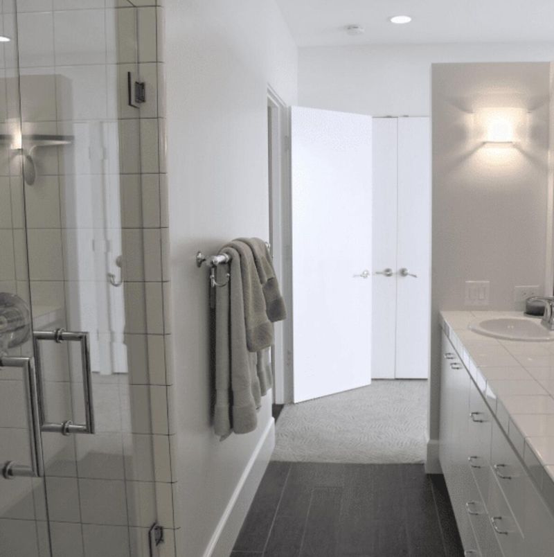 Bathroom, Glass Shower, Interior, Recessed Lighting, Tile Countertops, Wood Texture Flooring