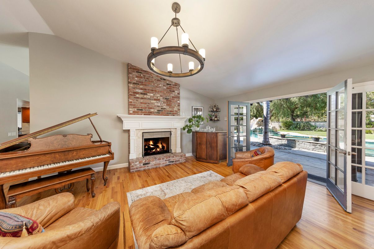 Fireplace, Interior, Living room, Pendant Lights, Piano, Stone Walls, Wood Texture Flooring