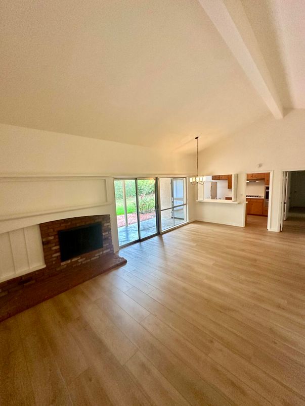 Empty room, Fireplace, Interior, Pendant Lights, Wood Texture Flooring