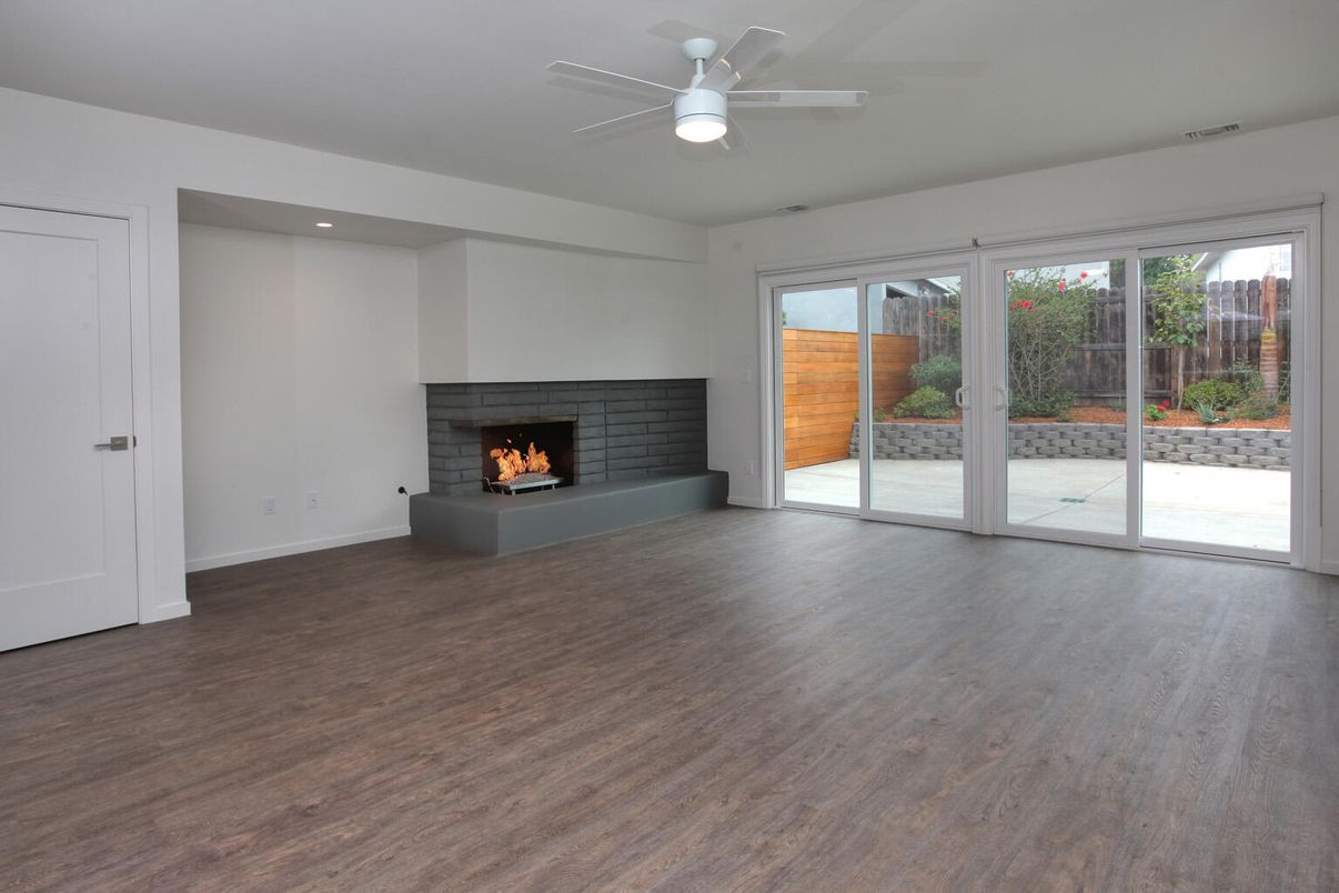 Empty room, Fireplace, Interior, Recessed Lighting, Wood Texture Flooring