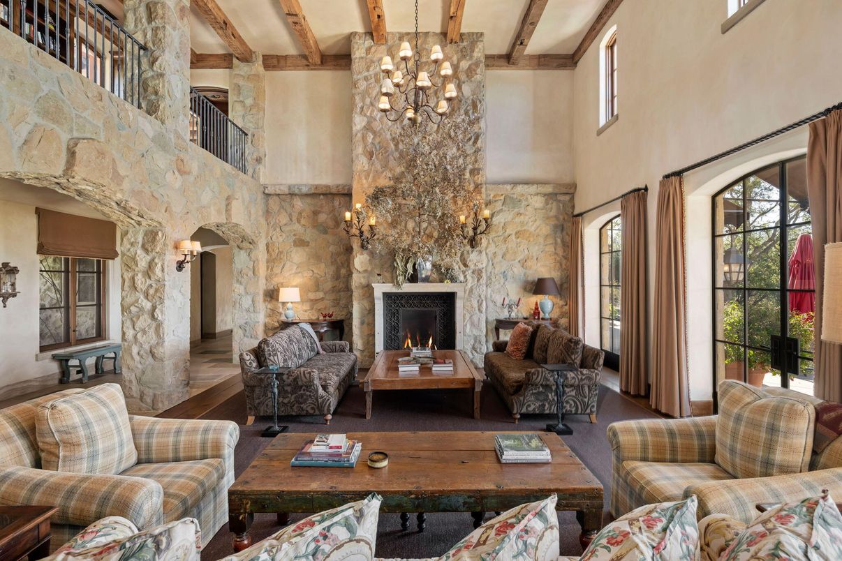 Chandelier, Fireplace, Interior, Living room, Stone Walls, Wooden Beams, Wood Texture Flooring