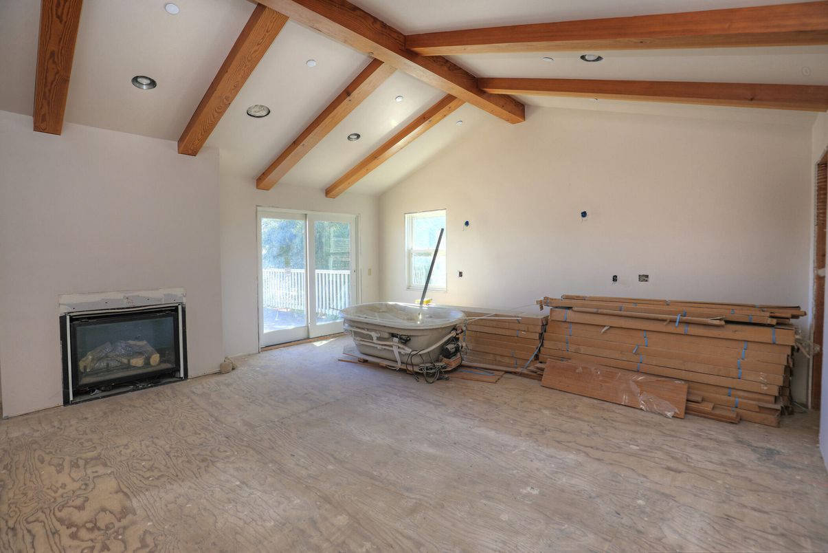 Empty room, Fireplace, Interior, Recessed Lighting, Wooden Beams, Wood Texture Flooring