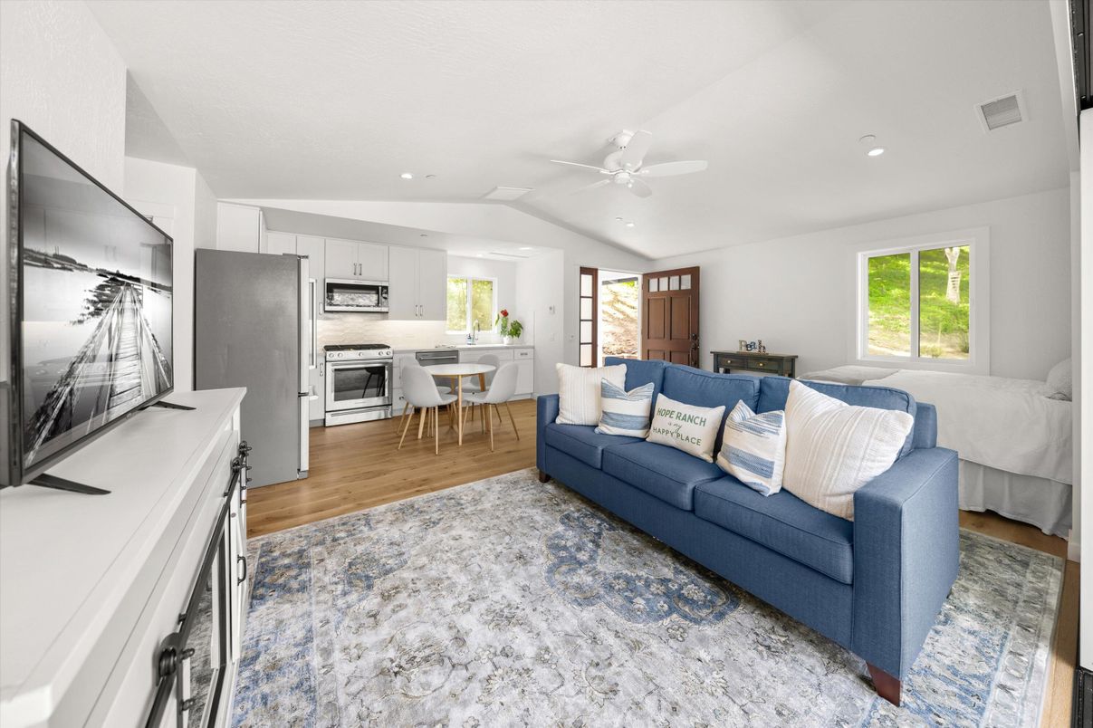 Dining room, Interior, Kitchen, Living room, Recessed Lighting, Stainless Steel Appliances, Wood Texture Flooring