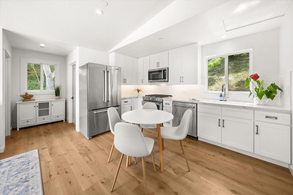 Dining room, Interior, Kitchen, Recessed Lighting, Stainless Steel Appliances, Wood Texture Flooring