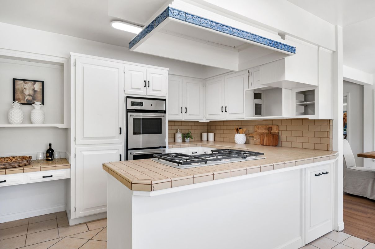 Interior, Kitchen, Stainless Steel Appliances, Tile Countertops, Wood Texture Flooring