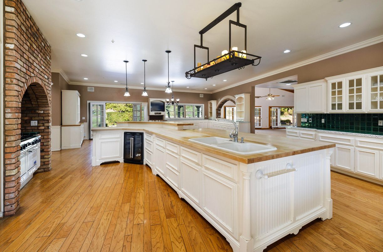 Fireplace, Interior, Kitchen, Pendant Lights, Recessed Lighting, Stone Walls, Wood Texture Flooring