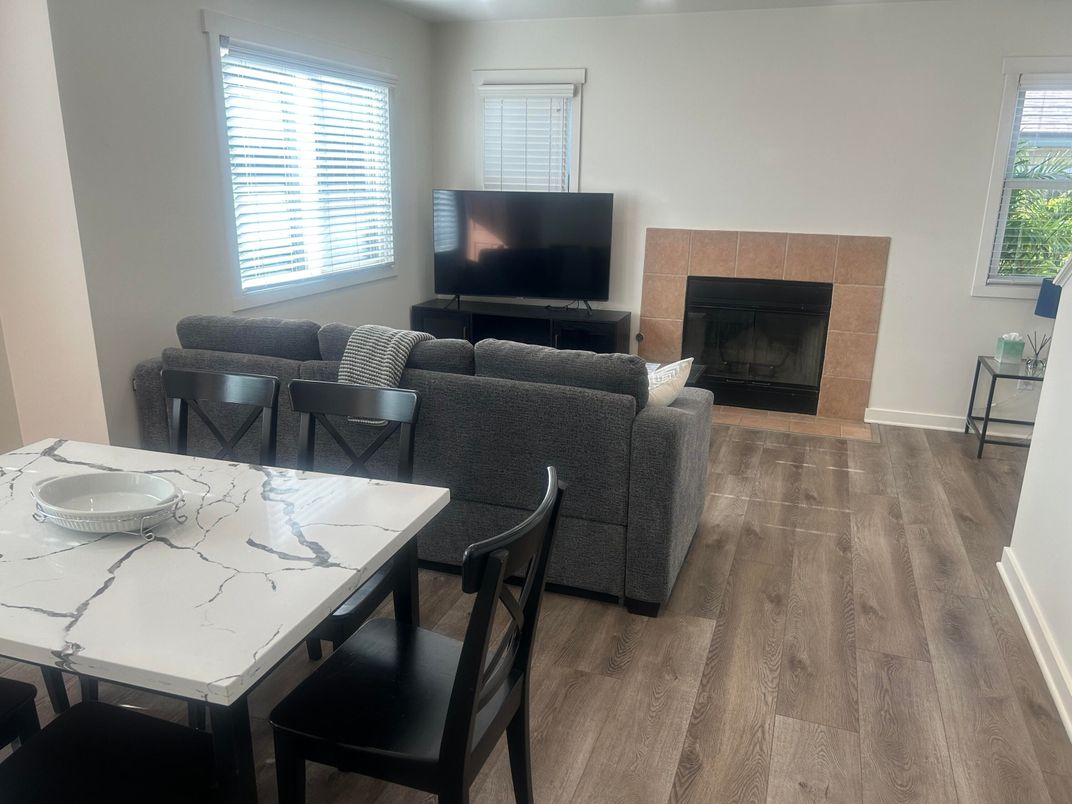 Dining room, Fireplace, Interior, Living room, Wood Texture Flooring