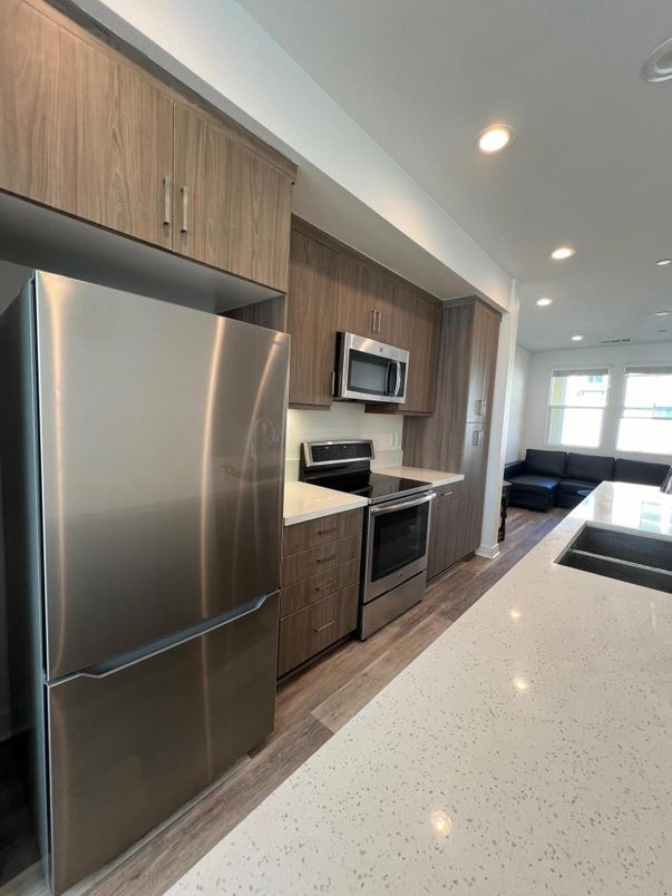 Interior, Kitchen, Recessed Lighting, Stainless Steel Appliances, Wood Texture Flooring