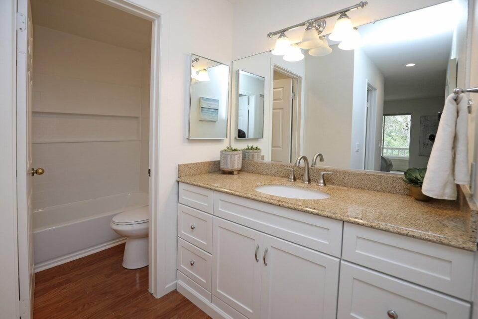Bathroom, Dual Sink Vanities, Interior, Recessed Lighting, Wood Texture Flooring