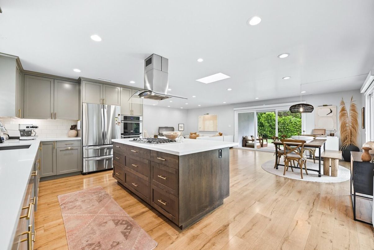 Dining room, Interior, Kitchen, Pendant Lights, Recessed Lighting, Stainless Steel Appliances, Wood Texture Flooring