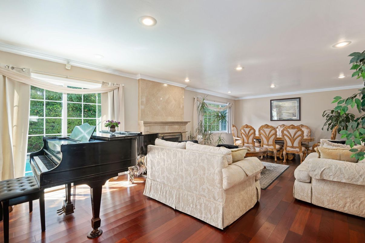 Fireplace, Interior, Living room, Piano, Recessed Lighting, Wood Texture Flooring