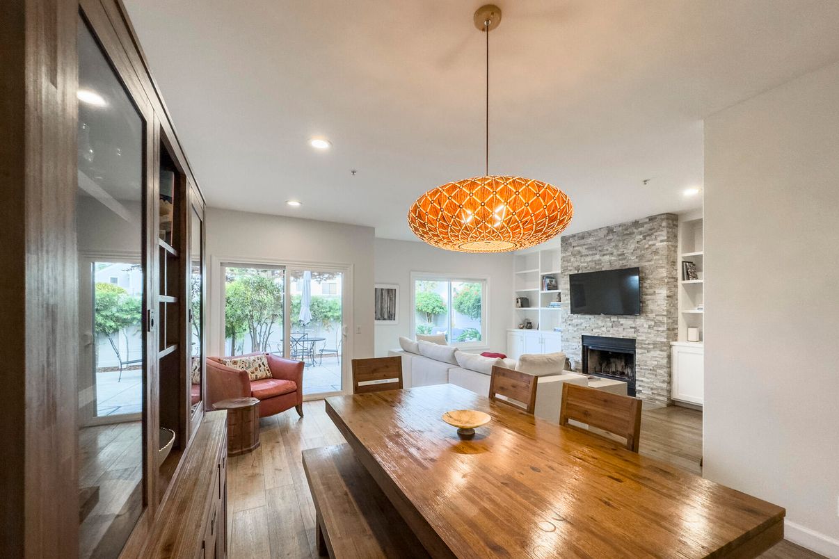 Dining room, Fireplace, Interior, Living room, Pendant Lights, Recessed Lighting, Stone Walls, Wood Texture Flooring