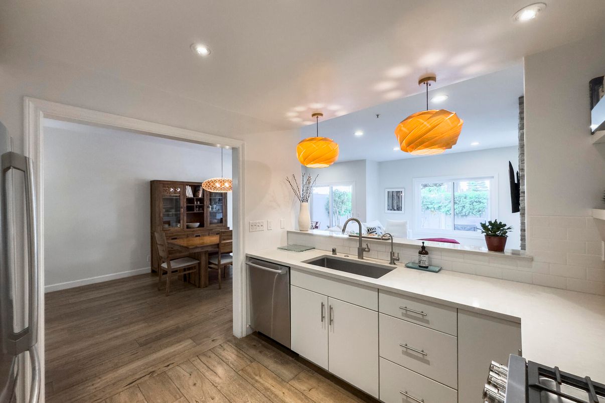 Dining room, Interior, Kitchen, Pendant Lights, Recessed Lighting, Stainless Steel Appliances, Wood Texture Flooring