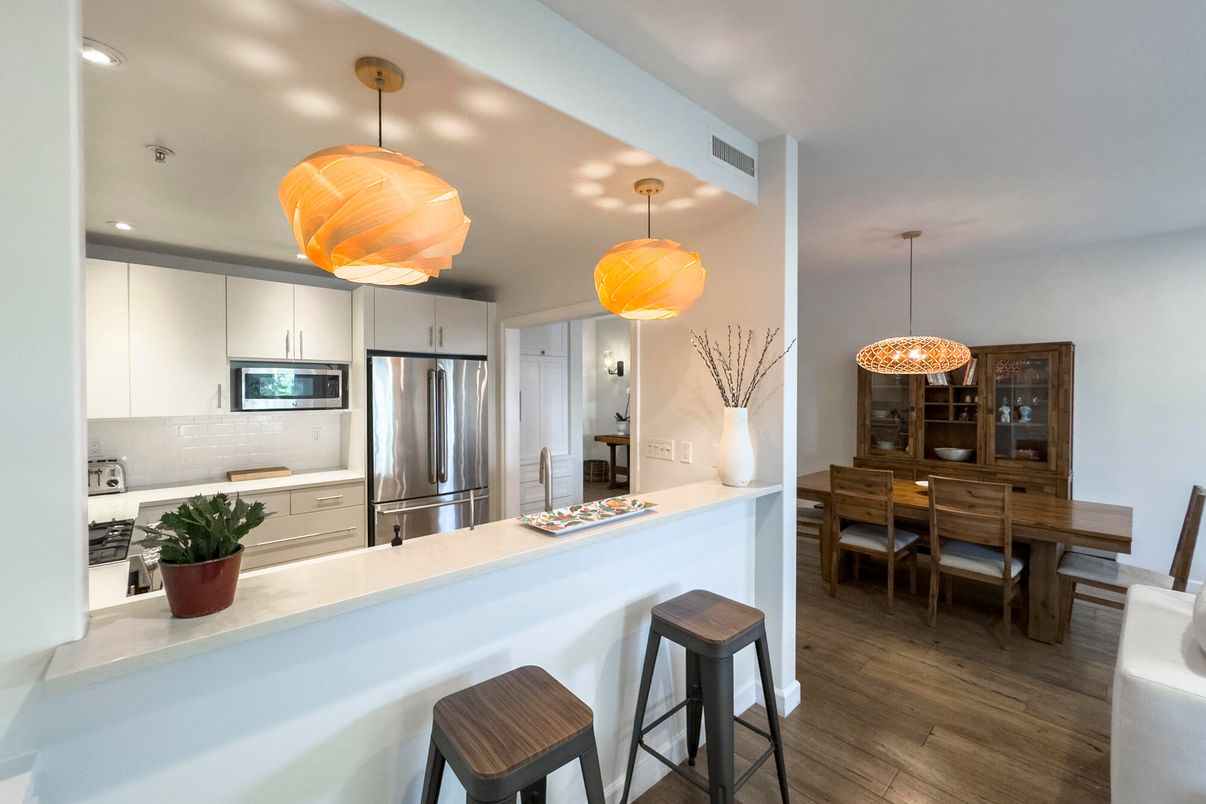 Dining room, Interior, Kitchen, Pendant Lights, Recessed Lighting, Stainless Steel Appliances, Wood Texture Flooring