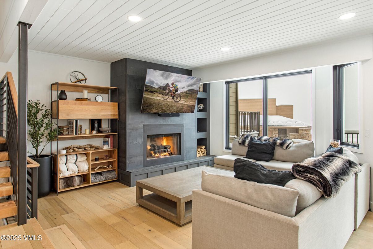 Fireplace, Interior, Living room, Recessed Lighting, Wood Texture Flooring