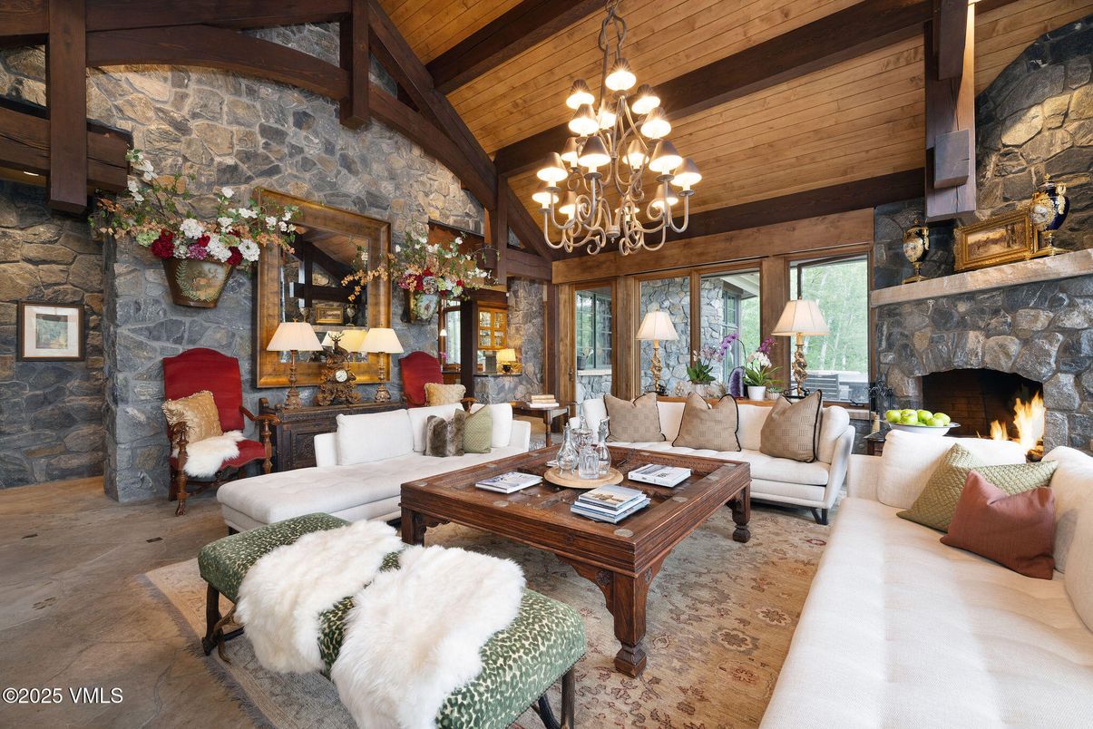 Chandelier, Fireplace, Interior, Living room, Stone Walls, Wooden Beams, Wooden Ceilings