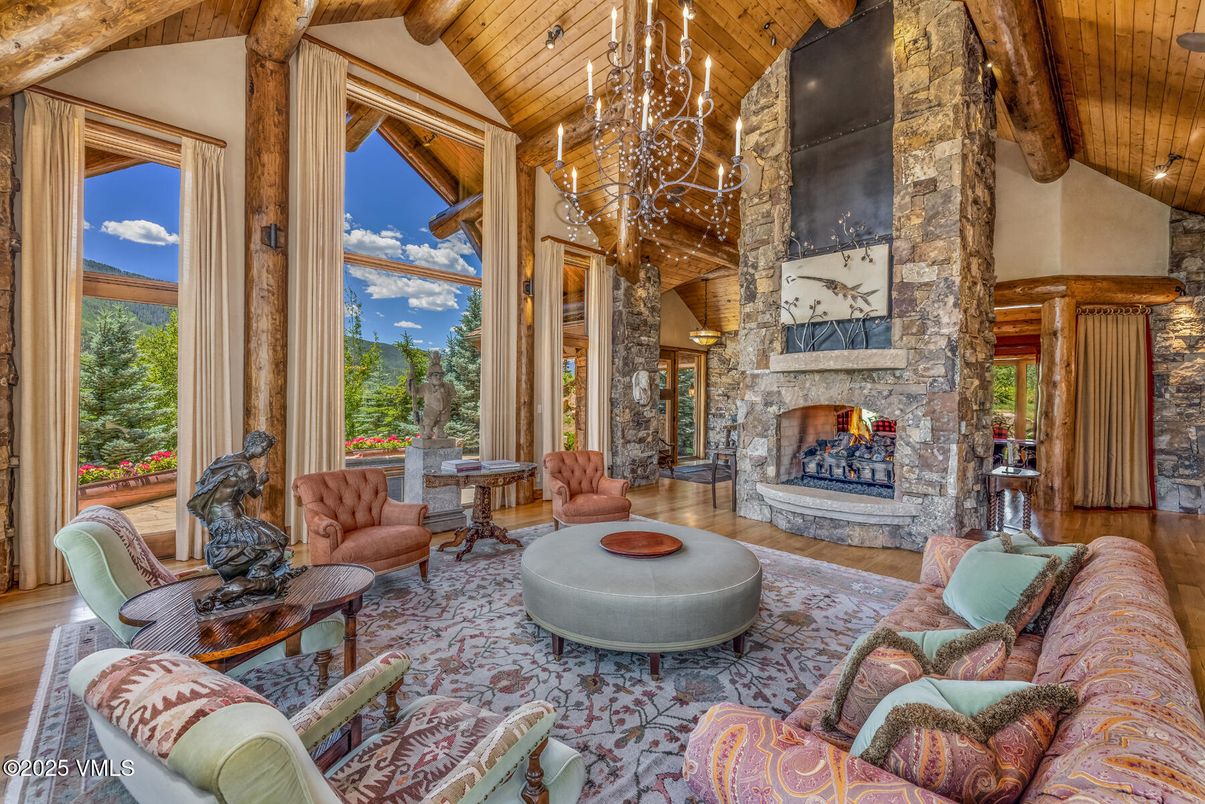 Chandelier, Fireplace, Interior, Living room, Stone Walls, Wooden Beams, Wooden Ceilings, Wood Texture Flooring