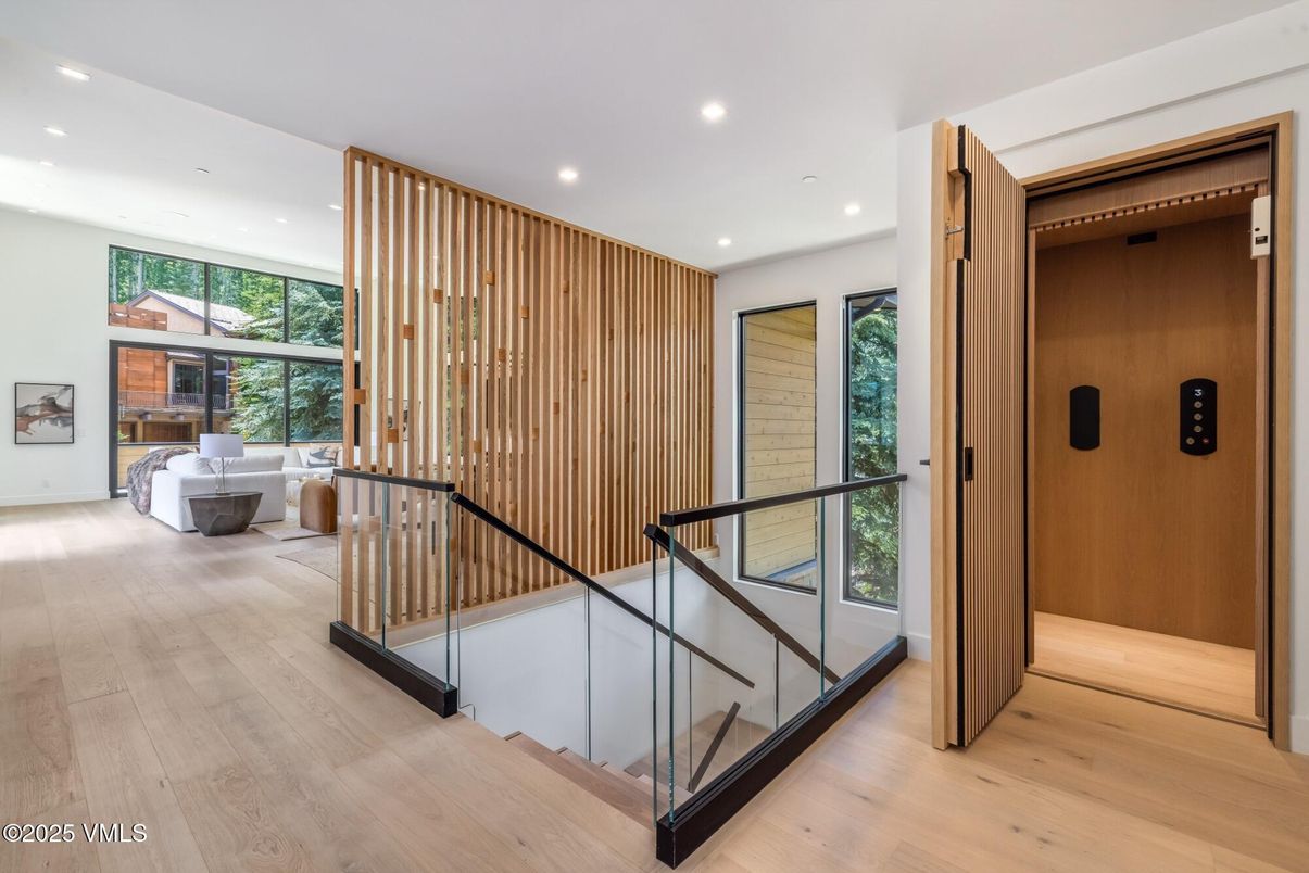 Elevator, Interior, Recessed Lighting, Wood Texture Flooring, Wooden Walls