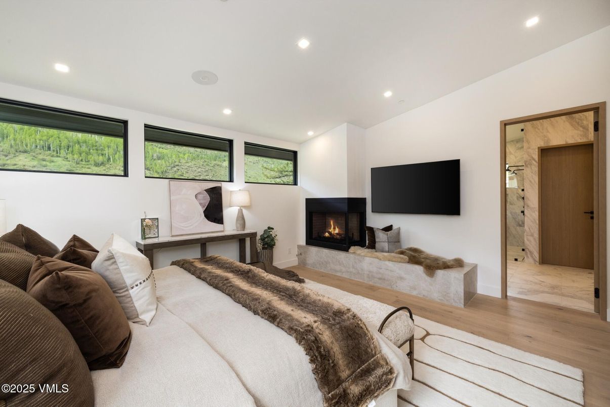 Bedroom, Fireplace, Interior, Recessed Lighting, Wood Texture Flooring