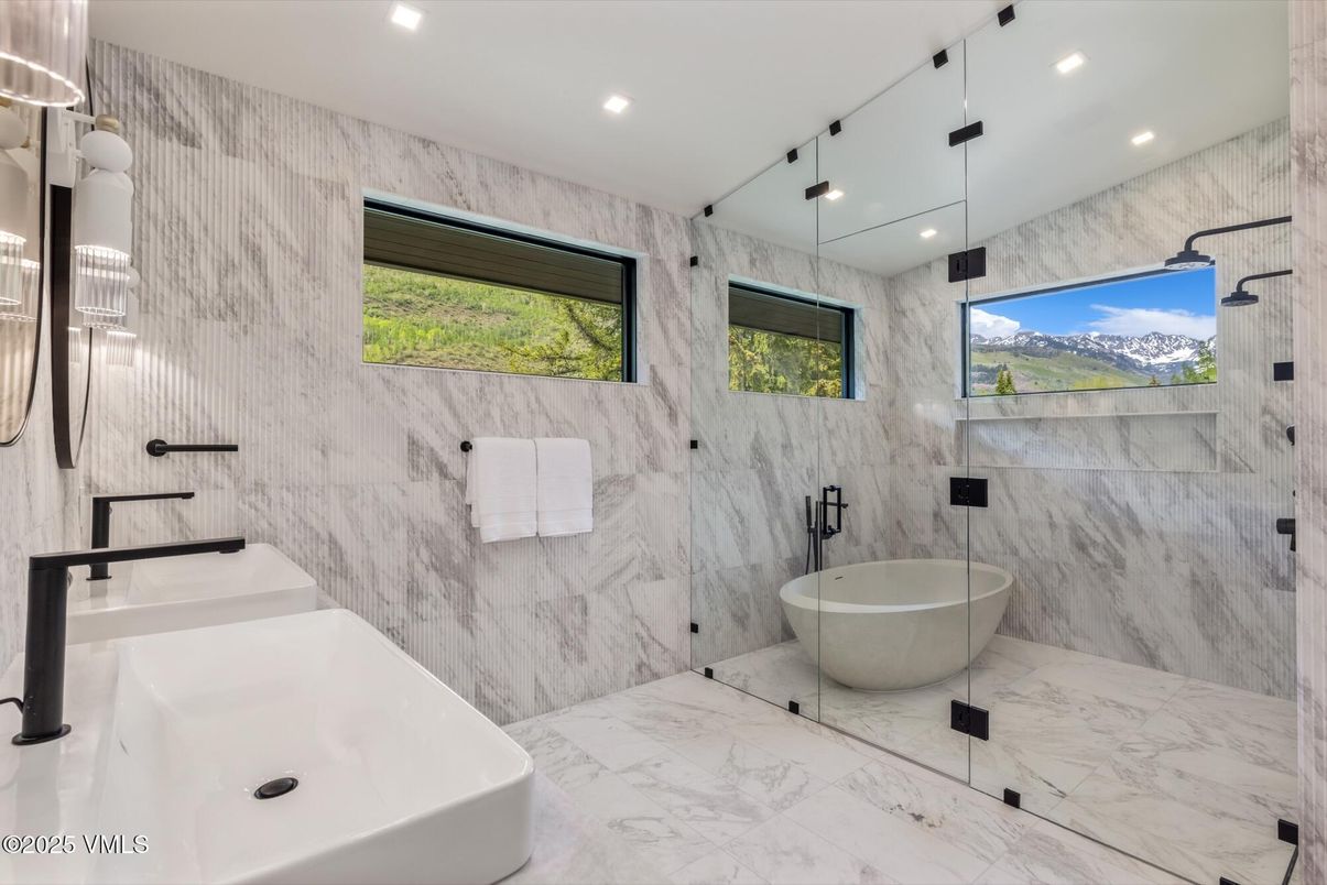 Bathroom, Dual Sink Vanities, Free Standing Baths, Glass Shower, Interior, Marble, Marble Walls, Recessed Lighting